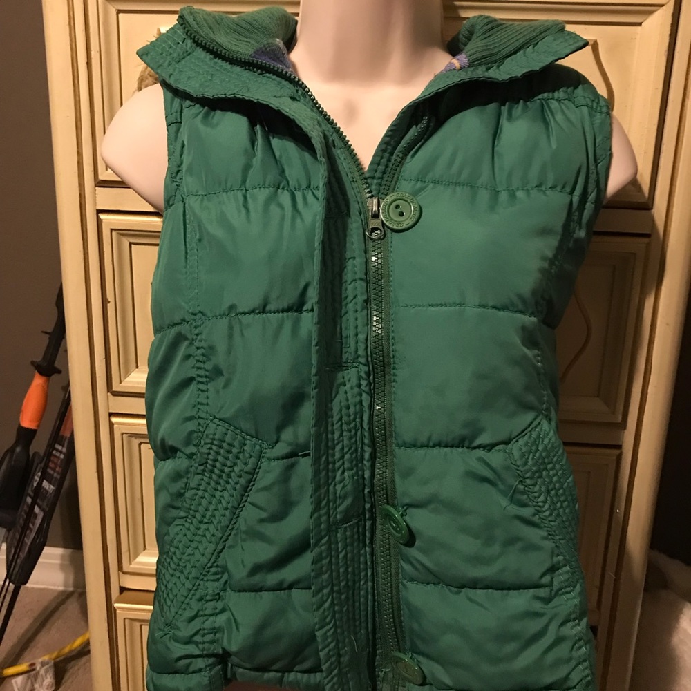 green fur vest